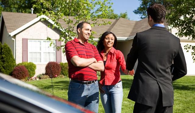 couple outside house