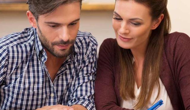 Couple reviewing their financial accounts.